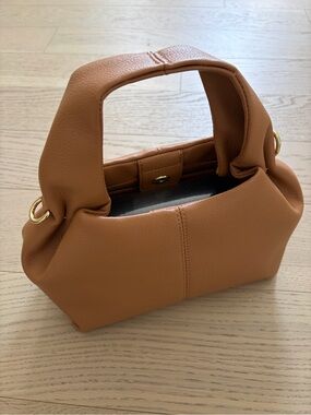 Amazon Pebbled Crossbody Mini Bag in Tan